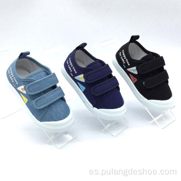 Nuevos zapatos clásicos de lona para bebé niño